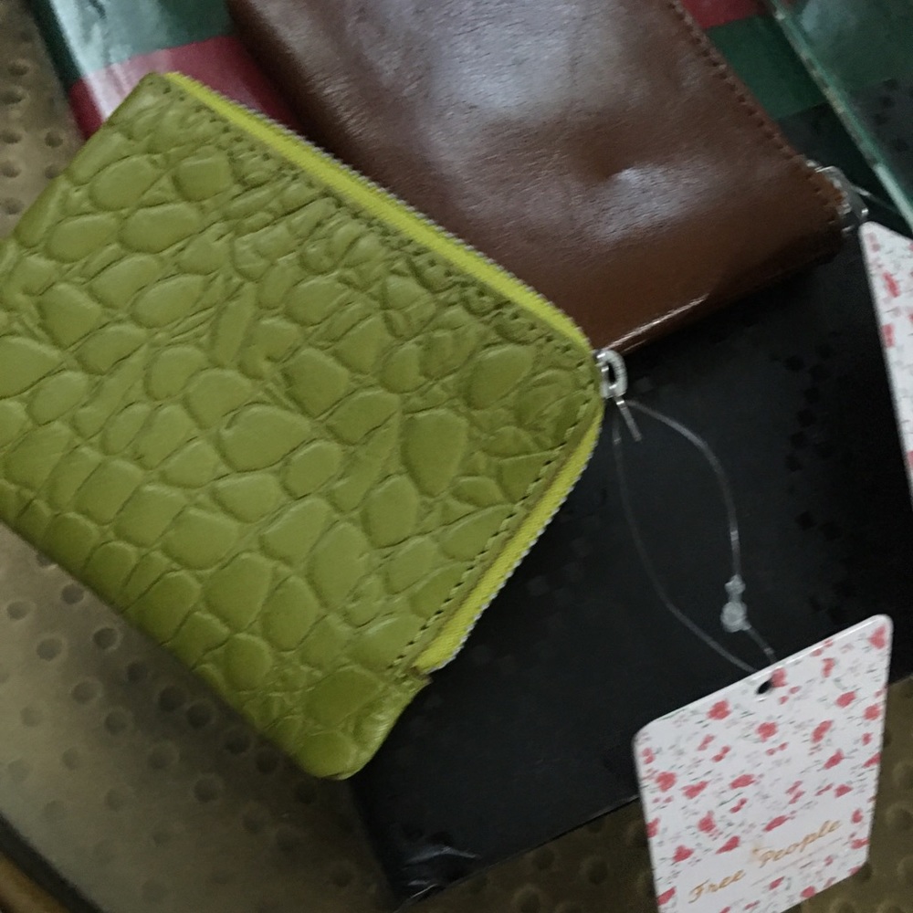 NWT Free People coin/card holder purses.

SOLD